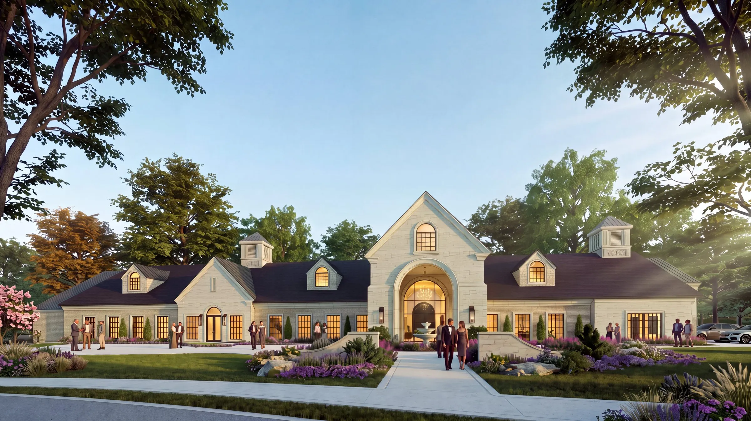 Rendering of The Manor at Old Hawthorne at dusk, a cream stone manor with an arched entry and warm lit windows
